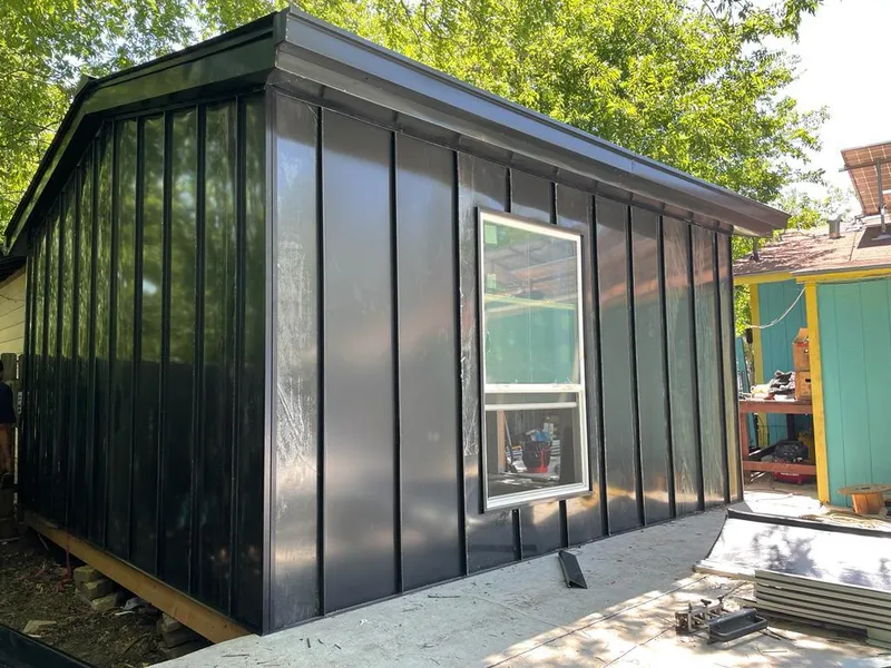 Black standing seam metal wall panels for Metal Roof Installation in Santa Fe